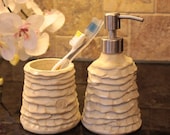 White/Cream lotion or soap pump bottle and brushes holder