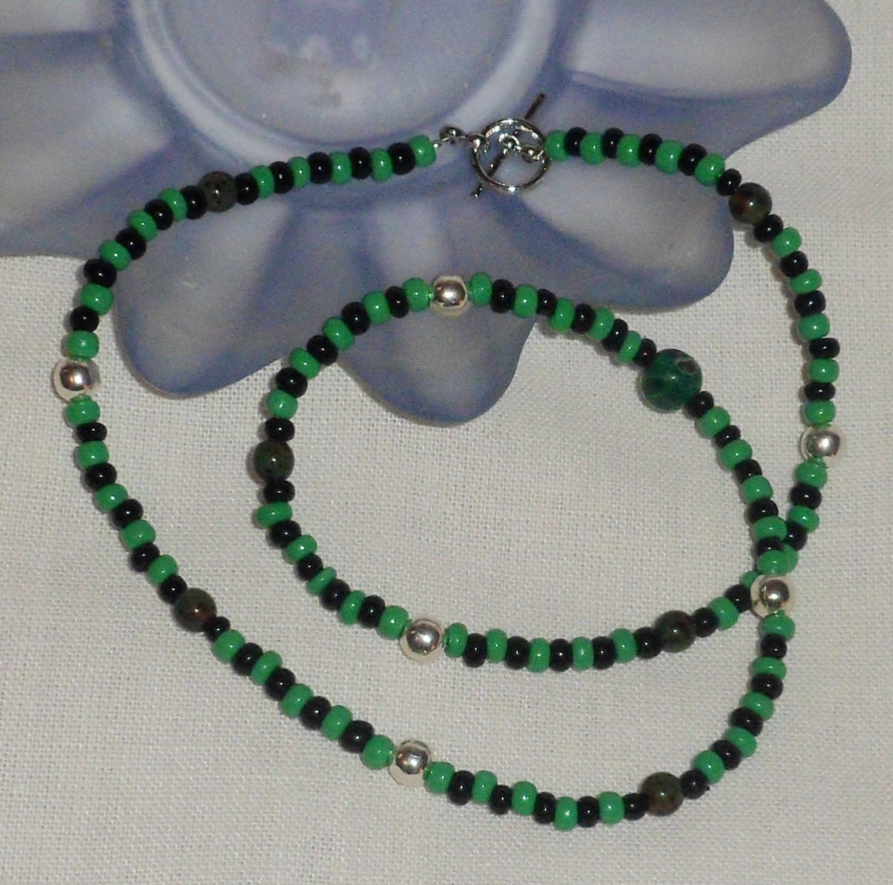 Necklace of green & black Czech glass beads, malachite beads and silver beads