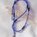 Necklace of blue Czech and hematite beads
