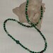Necklace of green & black Czech glass beads, malachite beads and silver beads