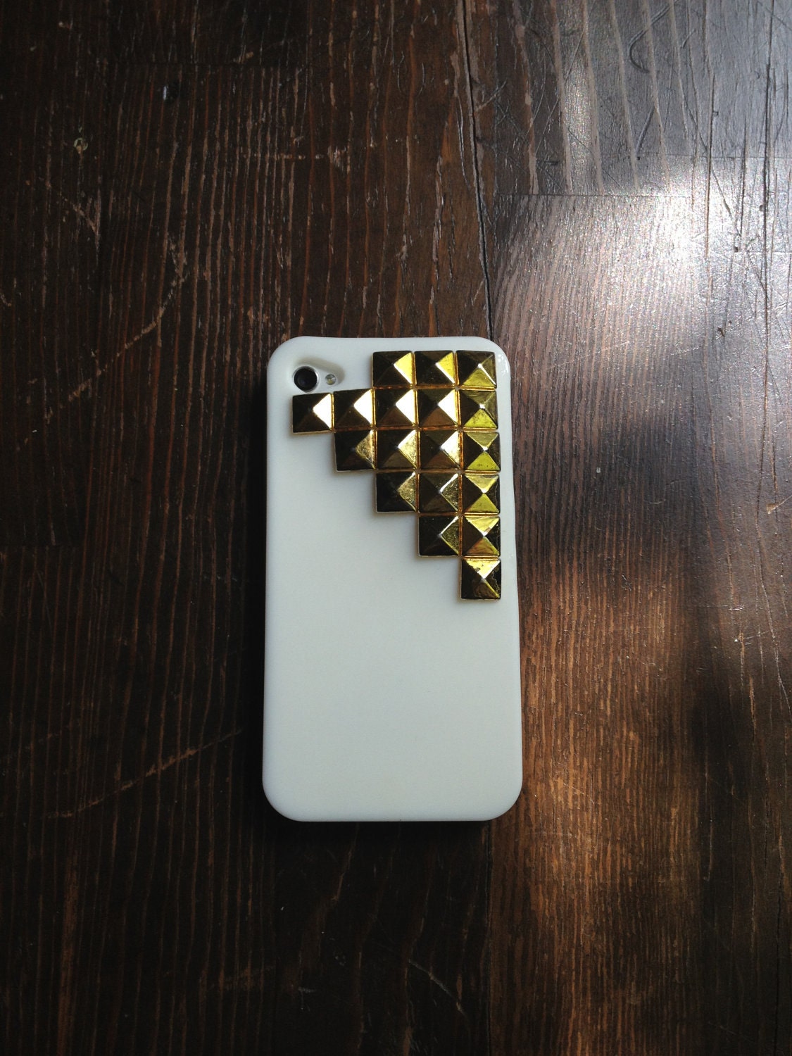 Vintage-inspired gold stud iphone case