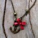 Anchors Away. With Red Bow. Antique bronze/brass anchor charm bracelet