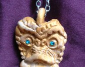 Tiki God pendant with swarovski crystal eyes