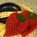 Potholders, strawberry shaped crochet in a cotton yarn.