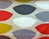 One Yard - Retro geometric eyelets in natural color with detail in red, grey, white and green