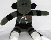 ROGER.... the green and black striped sock monkey