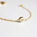 tiny skull bracelet - matt 14k gold plated skull on gold chain