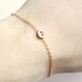 tiny skull bracelet - matt 14k gold plated skull on gold chain