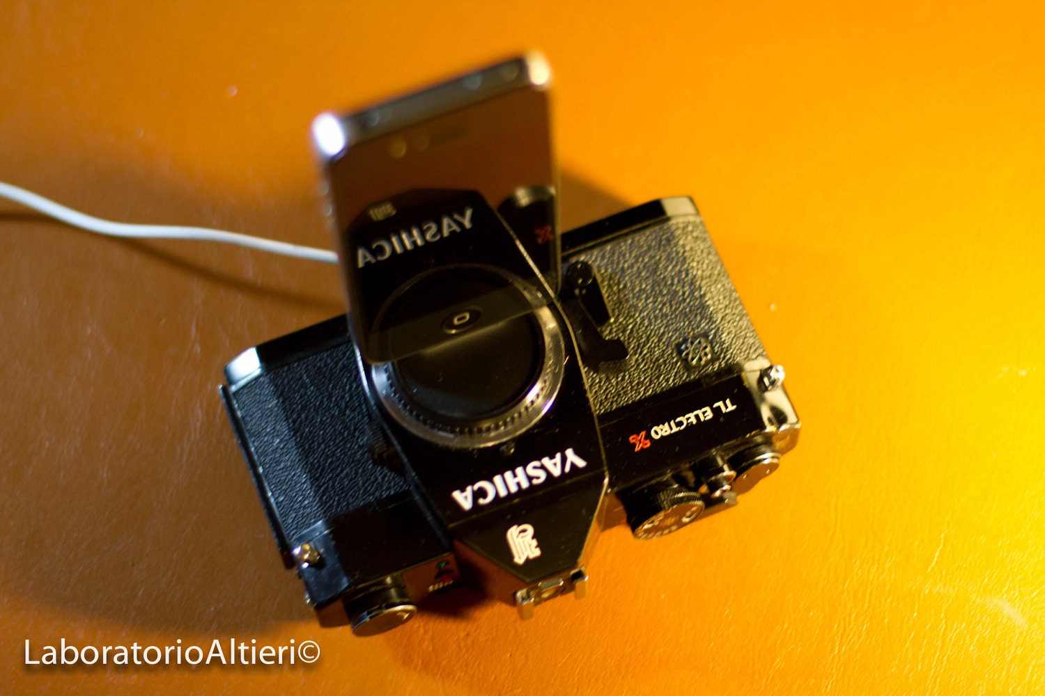 iPhone charger / dock from vintage camera - YASHICA Electro