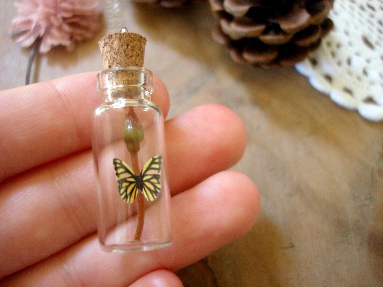 Peachy Yellow Monarch Butterfly Sitting Atop A Rose Bud Miniature Terrarium Necklace Glass Vial - Woodland Apothecary