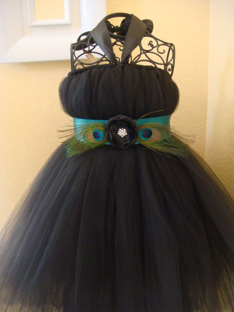Black tutu dress with teal peacock belt