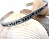 Never, Never, Never, Never Give Up Hand Stamped Skinny Bracelet - Stackable Aluminum Cuff