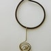 Bronze knot pendant