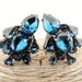 vintage 1950s clip-ons earrings. BLUE DE CHANEL.