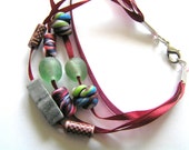 Maroon Ribbon, Polymer Clay, Marble, and Green Recycled Glass Beaded Bracelet