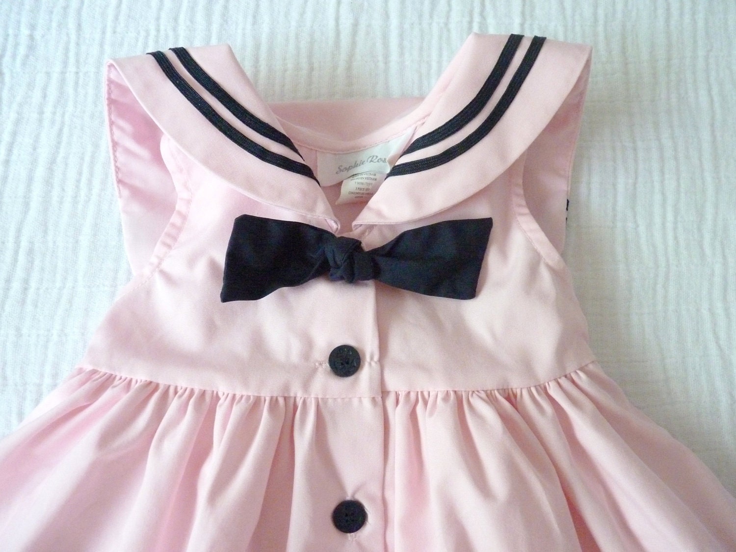 Pink and black baby sailor nautical dress, 12 months. Sleeveless, empire-waist, square sailor collar and a little black bow