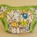 Diaper cover with snaps, made with 100% polyester knit PUL fabric. YOU PICK size.