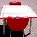 Vintage 1940's Red and White Enamel Top Distressed Dinette Table and Two Red Reproduction Chairs