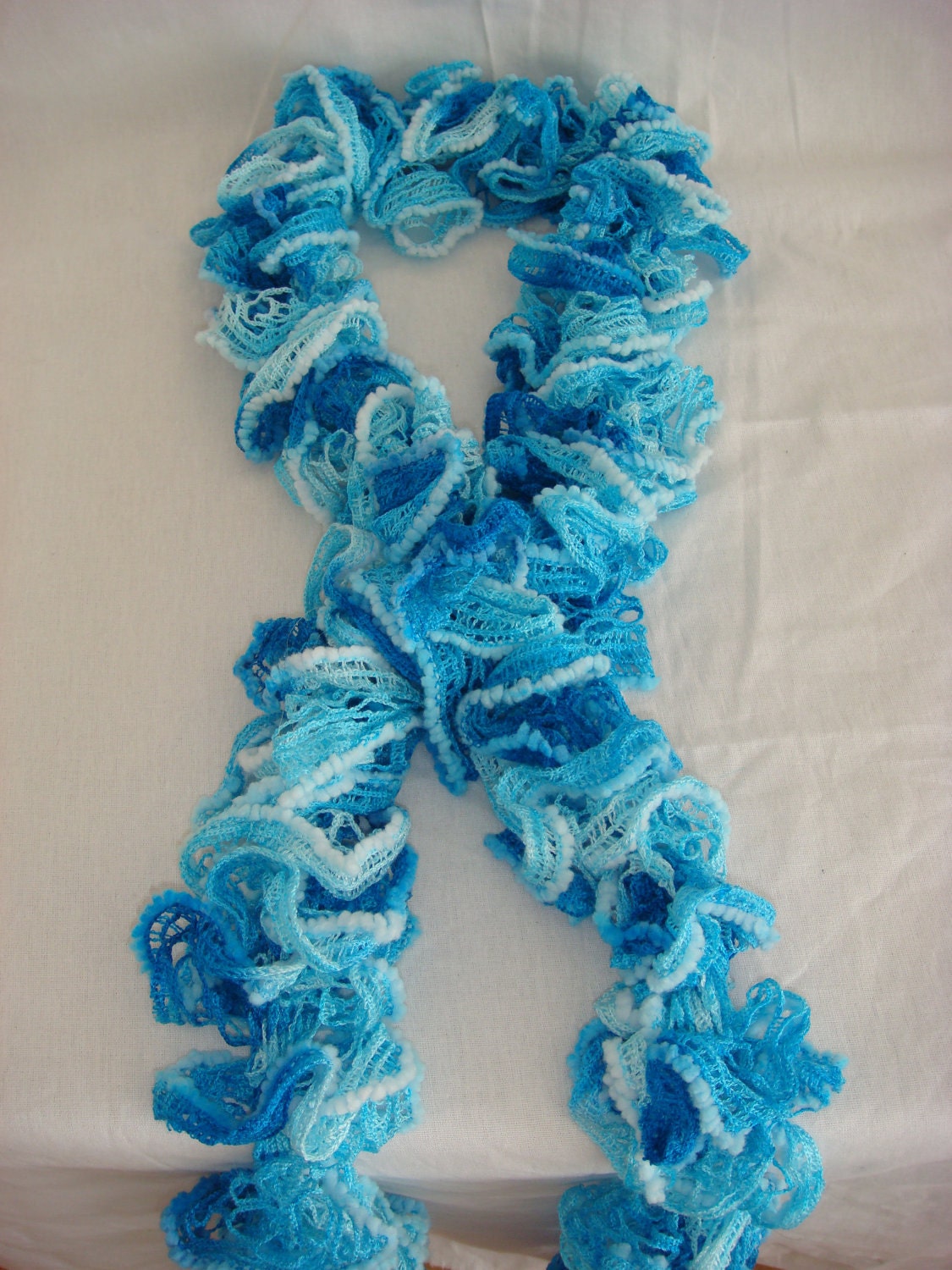 Hand knitted sky blue ruffled scarf