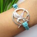 hunger game bracelet-- Mockingjay pendant,antique silver charm bracelet,blue leather bracelet, MORE COLOR