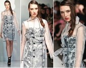Irina Shabayeva signature sheer mesh trench coat with black satin piping worn by FERGIE