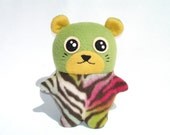 Plush hamster toy kawaii cutie, with bright zebra print and green fleece