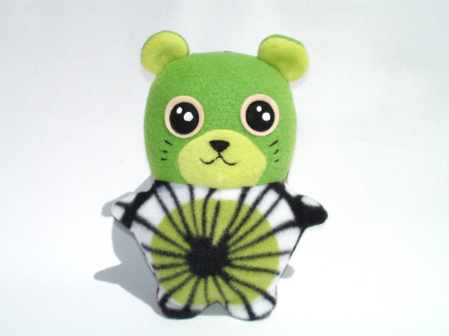 Stuffed animal hamster toy kawaii cutie in bright graphic and green fleece