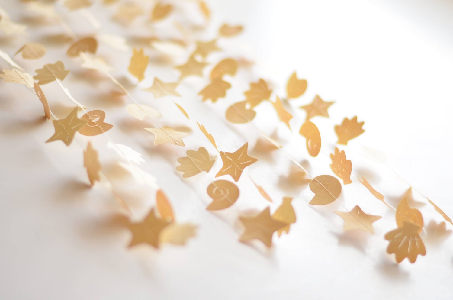Rustic beach wedding decor, sea shells and starfish paper garland from vintage book