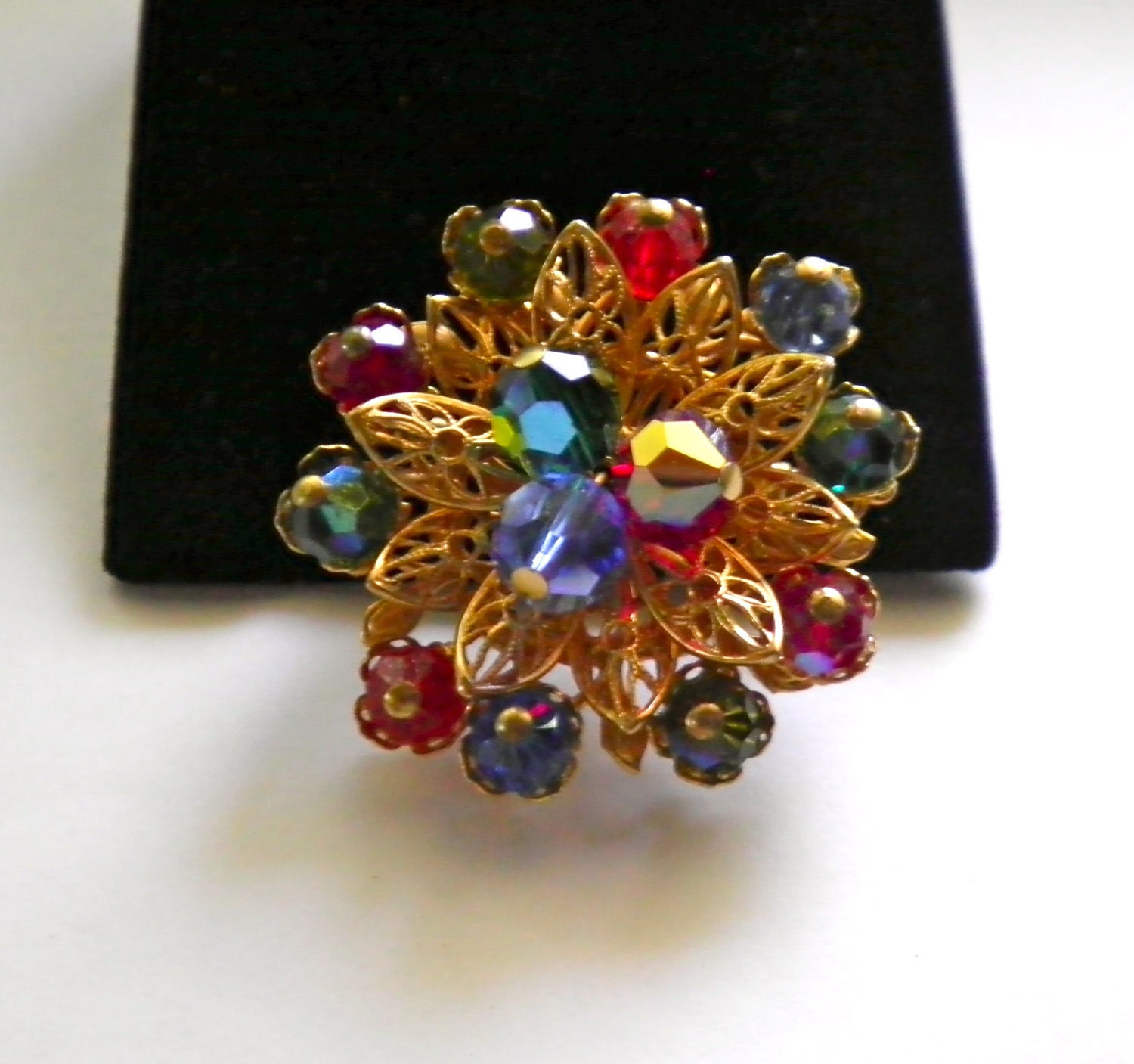 Vintage Glass Beads Floral Burst Brooch Pin Aurora Borealis and gold tone Filigree
