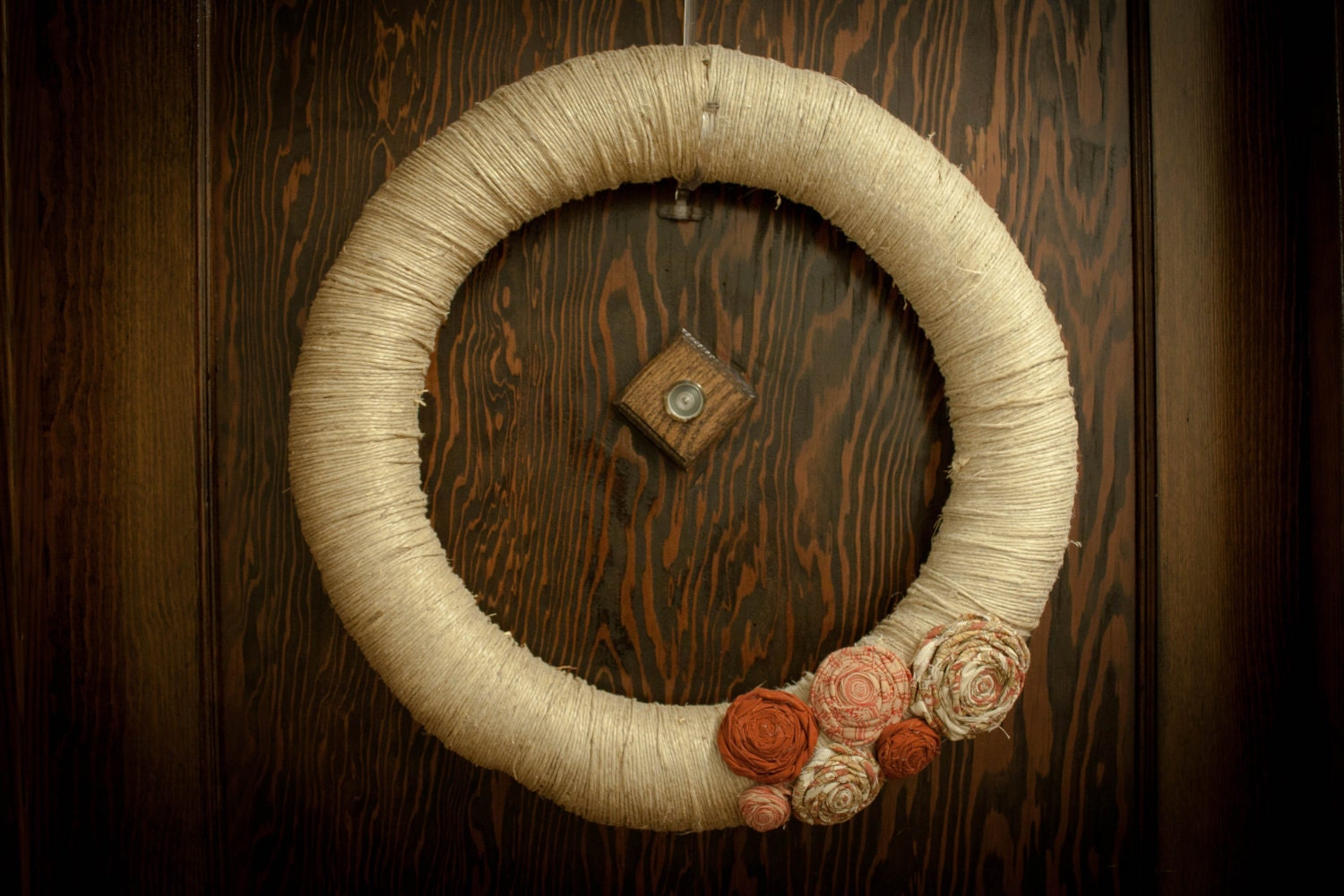 Twine wreath with rustic rosette accents