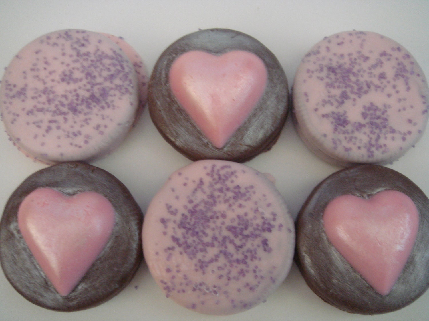 Valentine's Day Love Pink and purple heart chocolate covered Oreos for love wedding shower princess