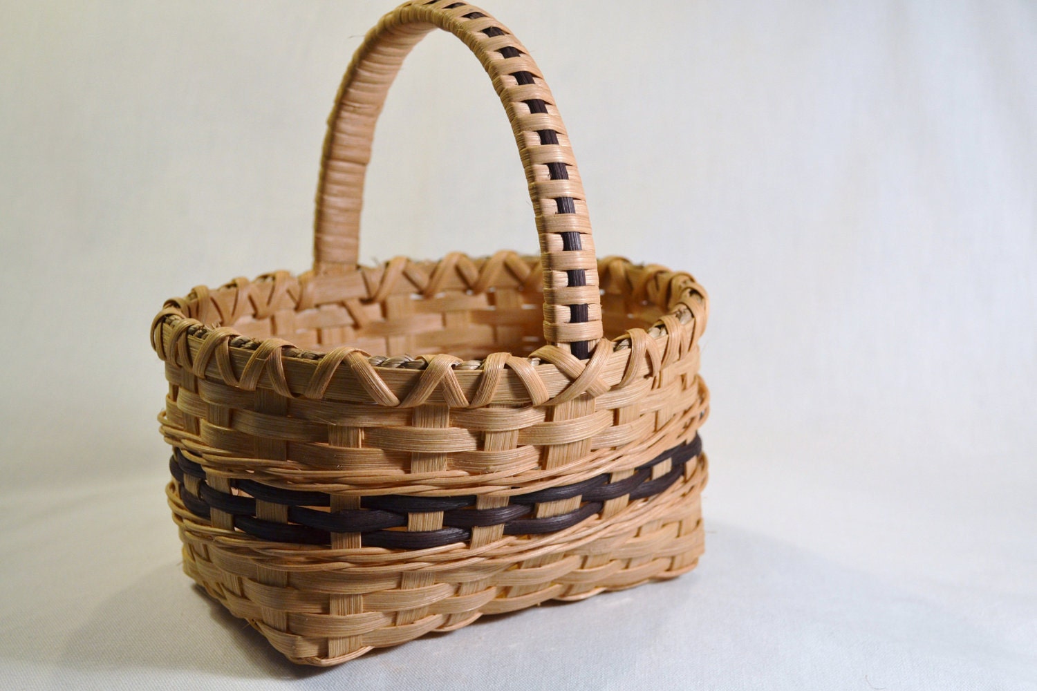 Small Handmade Reed or Wicker Basket with Black Accent for Flower Girl, Bath, or Table