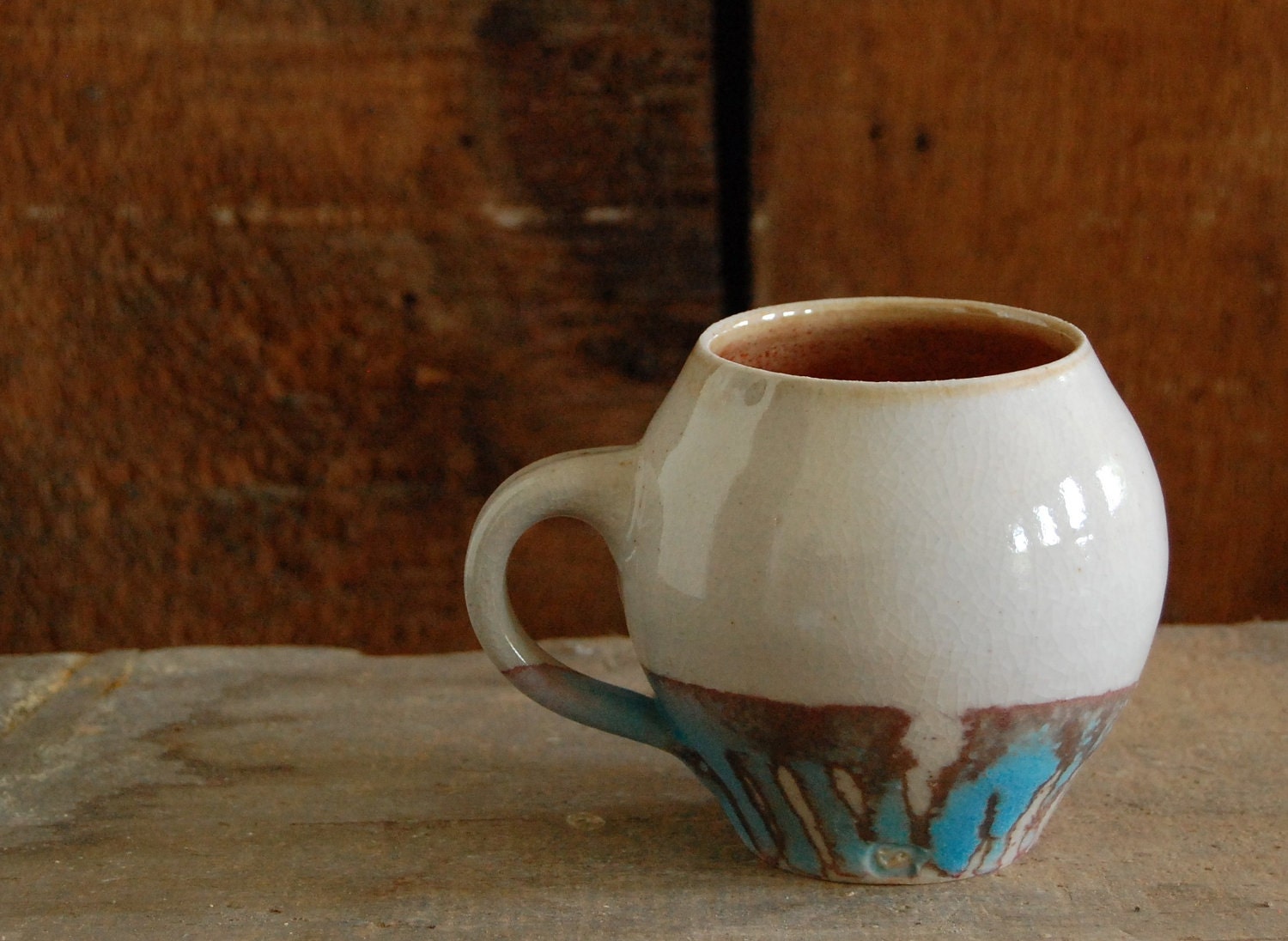 the perfect white and turquoise egg- shaped mug