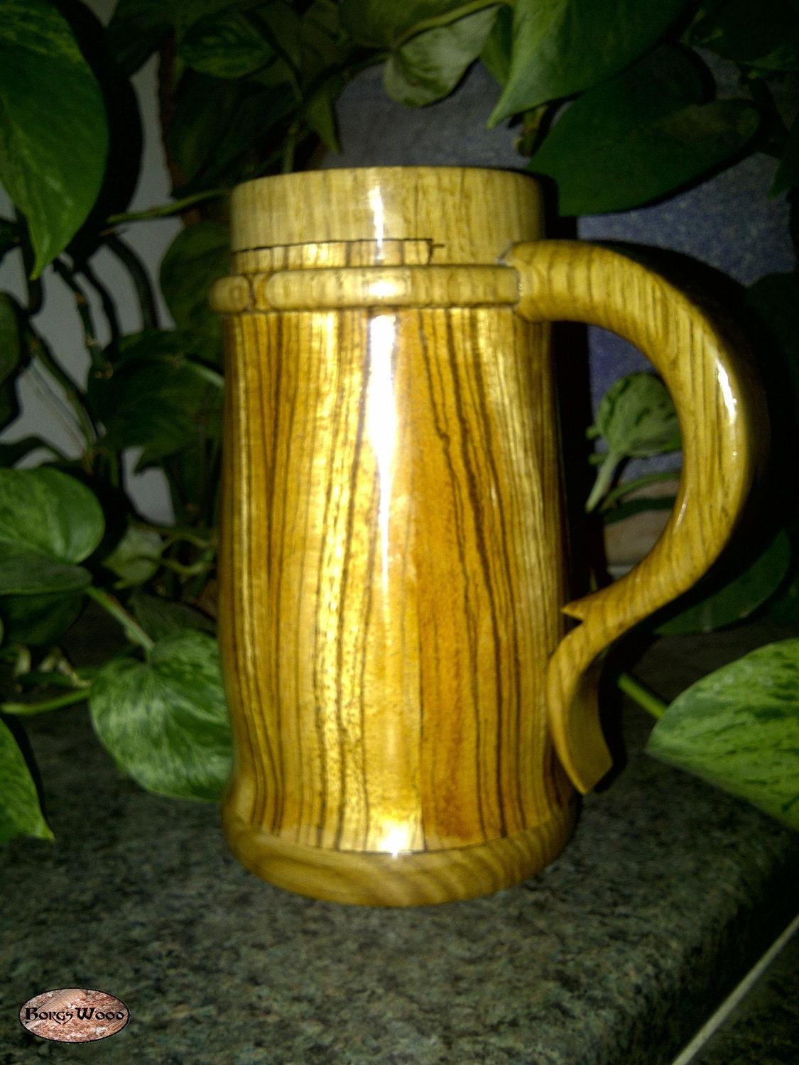 Zebra wood with Oak trim and handle