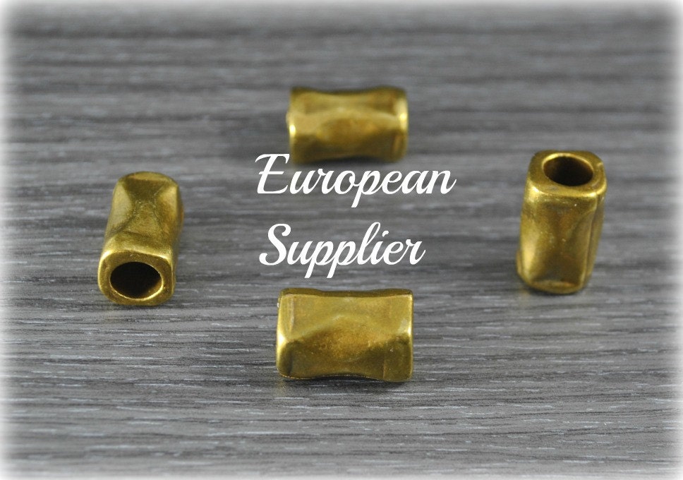 1 old gold tube spacer for  7mm cord - Make bracelets - Jewelry Findings - Supplies -  High Quality - European- OV-06