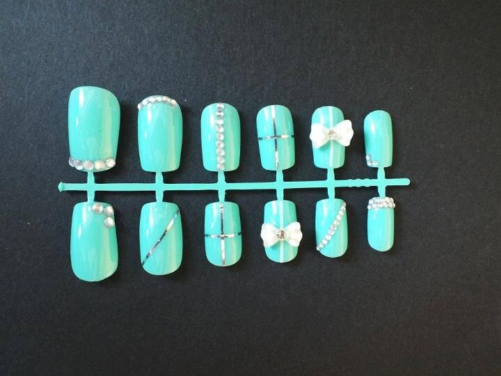Two Crafty Unicorns Aquamarine nails with 3D bows and rhinestones