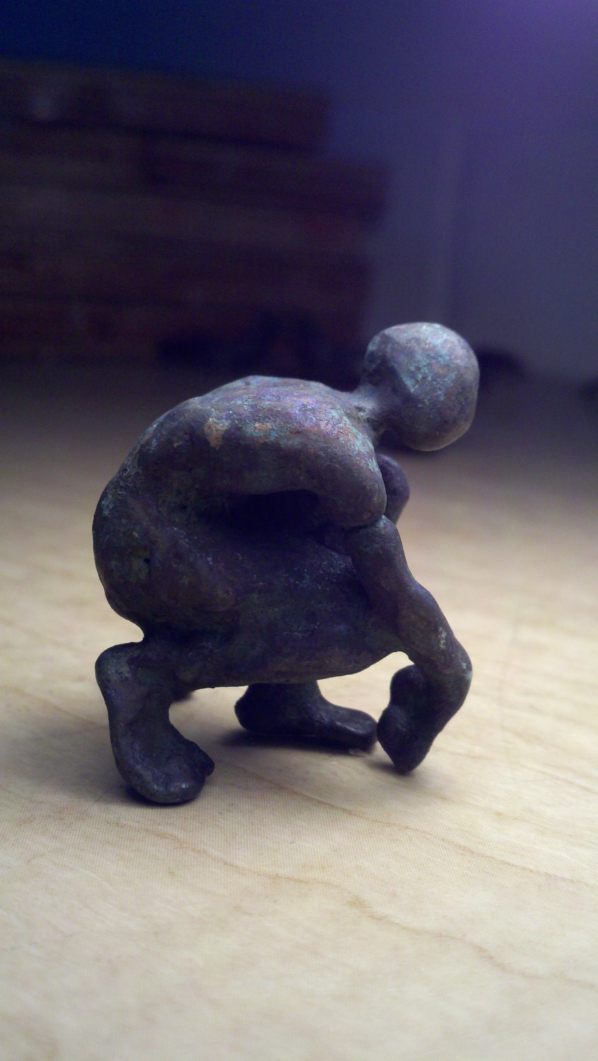 Crouching Small bronze figure - smallbronzes