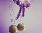 wire wrapped with garnet with  vintage lucite speckled olive beads