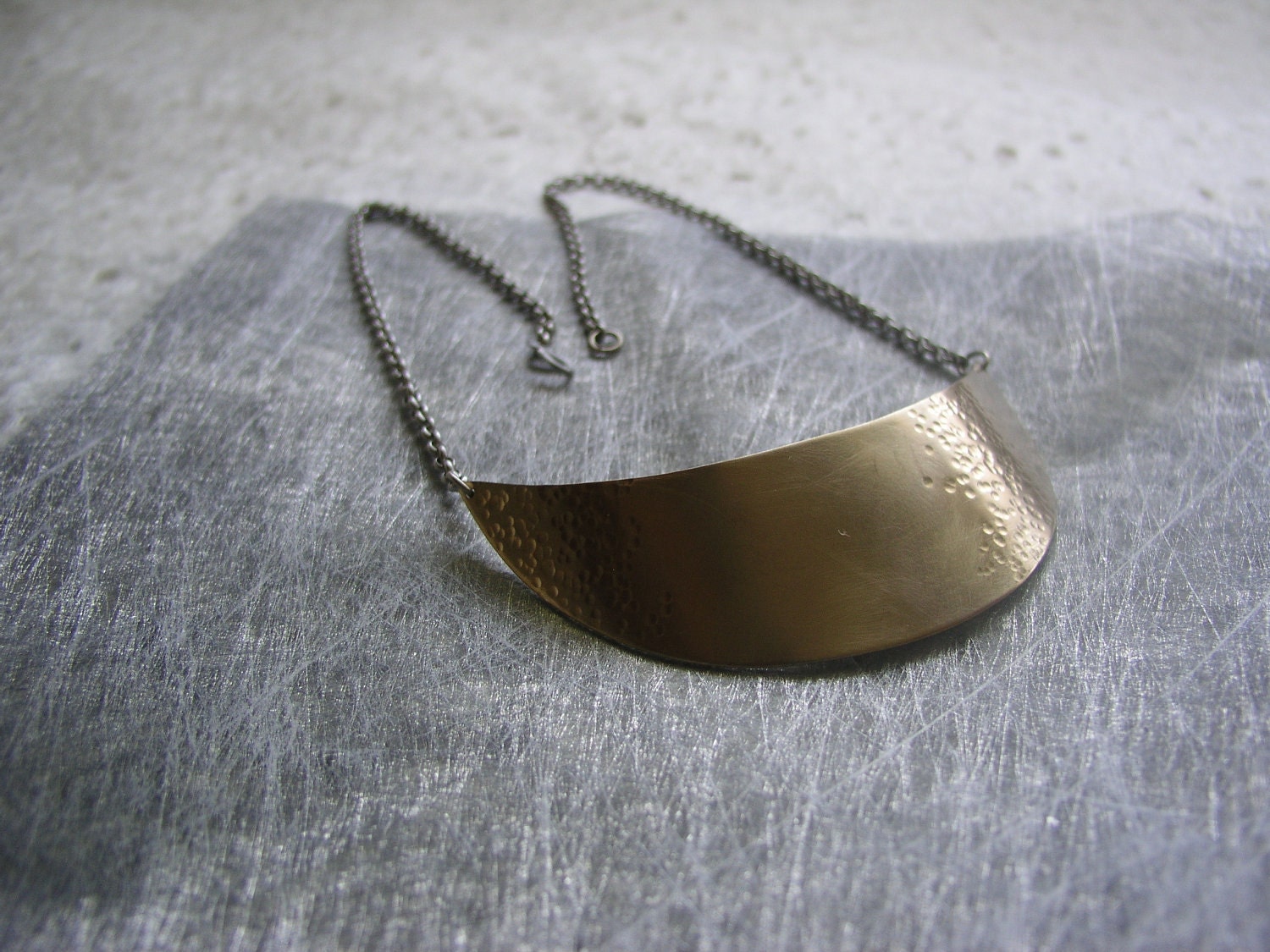 Brass crescent shield necklace