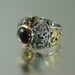 THE EMPRESS a statement ring in 14K gold and silver with Garnet and Citrine