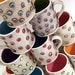 Funky Hand-Built Stoneware Mug with purple polka dots and green interior- studded, spotted mug