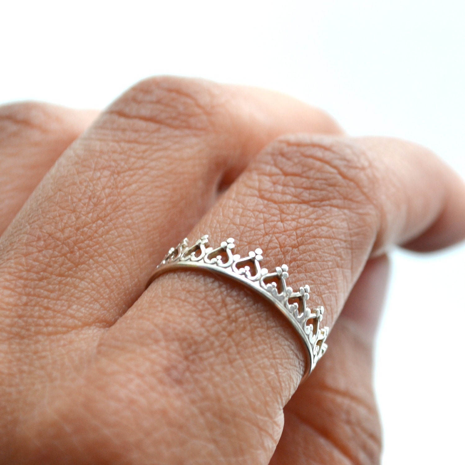 There is no queen without a crown ring, silver band,