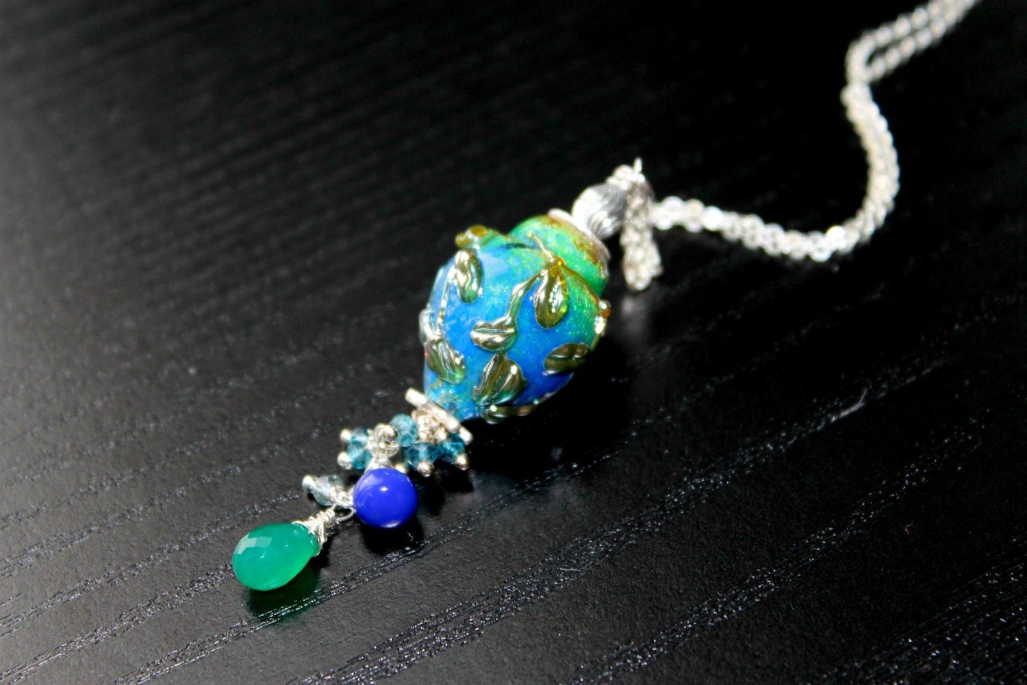 Green Onyx, Lapiz Lazuli, London Blue Topaz and enamelled lampwork bead in sterling silver necklace - A Peacock's Tale
