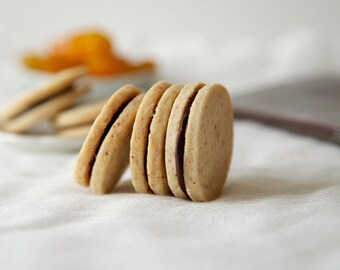 Pink Peppercorn Shortbread Sandwich Cookies with Chocolate Red Currant filling