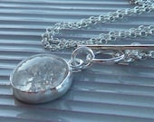 Crystal necklace with a sterling silver chain and handmade sterling toggle clasp. Icy Crystal silver necklace