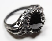 belonging to the darkness. sterling silver & black cz
