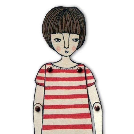 miniature moveable paper doll (in red stripes)