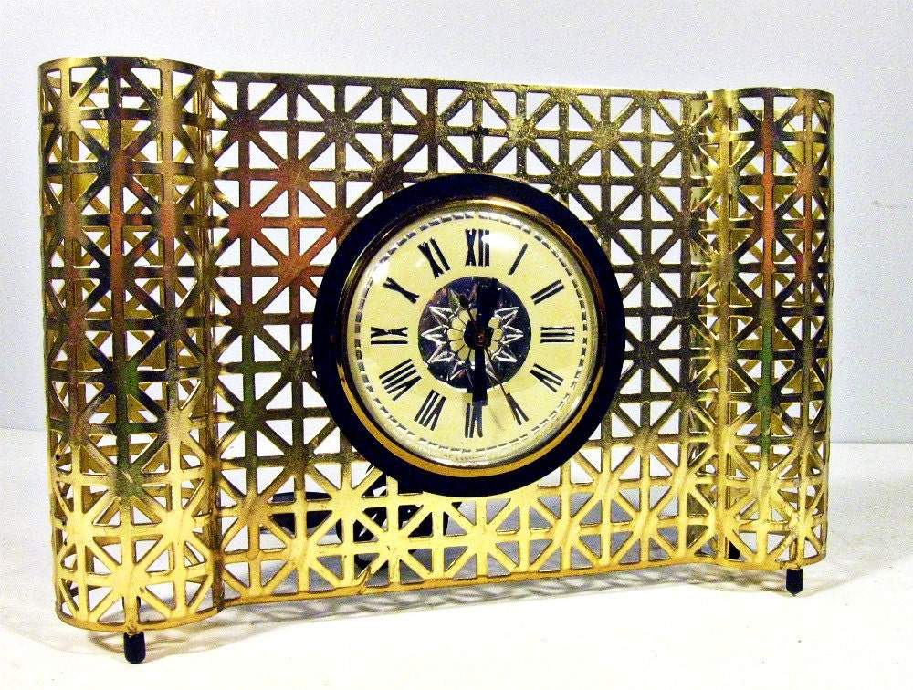 vintage mid century atomic eames era brass mantle clock