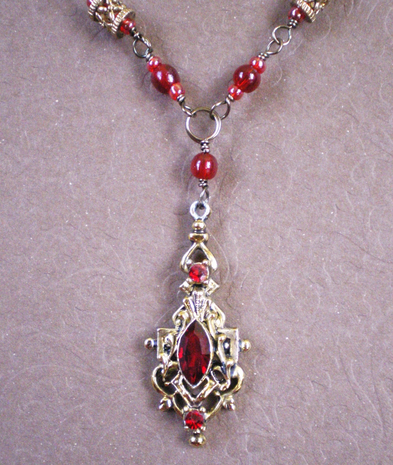 ON SALE Was 64 Vintage Red Glass Pendant Brass Wire Wrapped Rosary Style Necklace