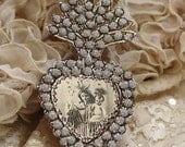 Crowned Mother and Child - a paper ex-voto locket